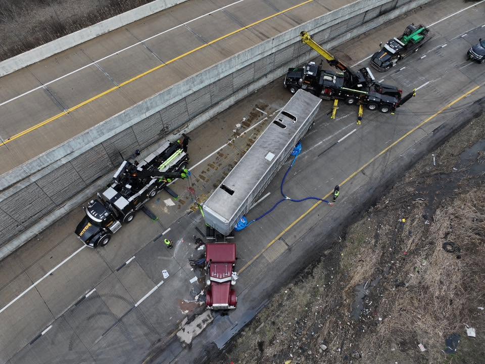 Aerial view of multi-truck recovery scene